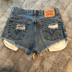 Vintage distressed Levi’s denim high waist shorts